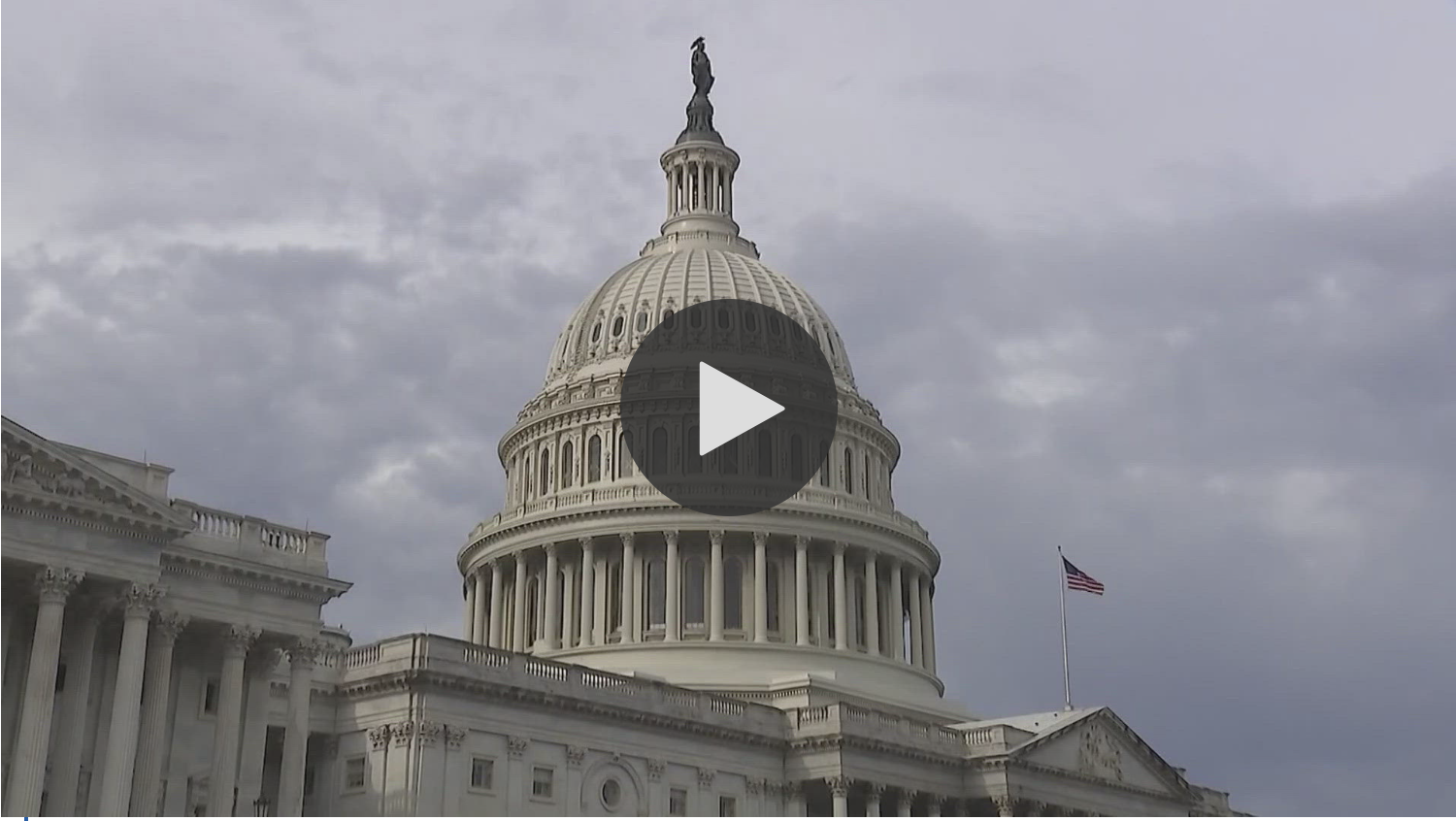Image of capitol with play button